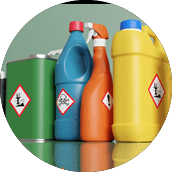 Plastic bottles and metallic tins having with different hazardous warning labels. Illustration of the concept of alert of chemical classification